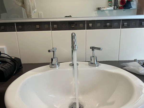 New taps running into a bathroom basin in Baldivis
