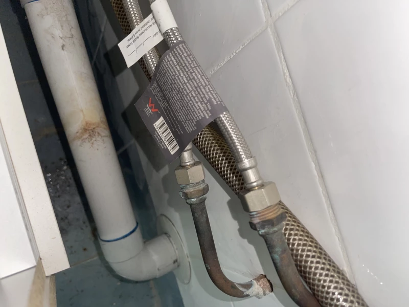Copper pipework and flexible hoses at a hot water valve repair in Kewdale