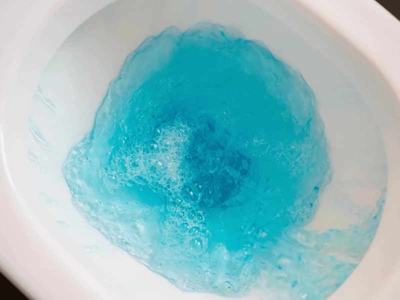 Flushing blue water down