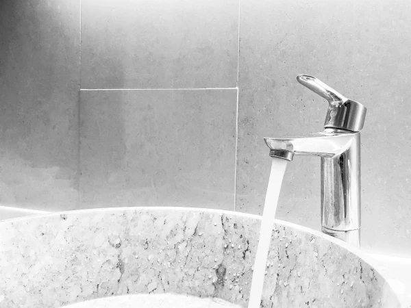 Water running from a mixer tap.