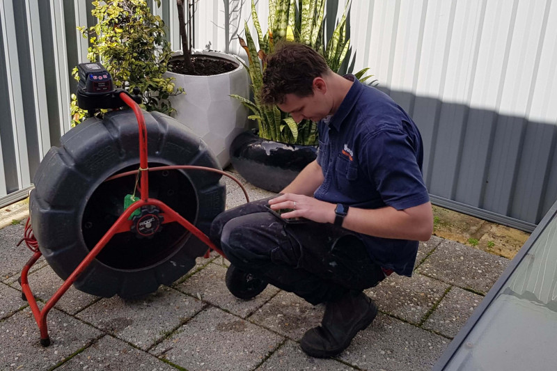 Michael from Swan's Plumbing carrying out a CCTV drain inspection