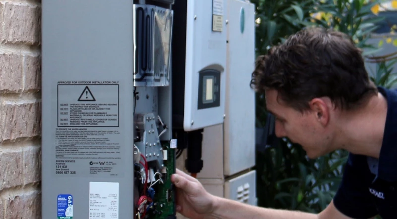 Michael our gas plumber fixing a gas hot water system