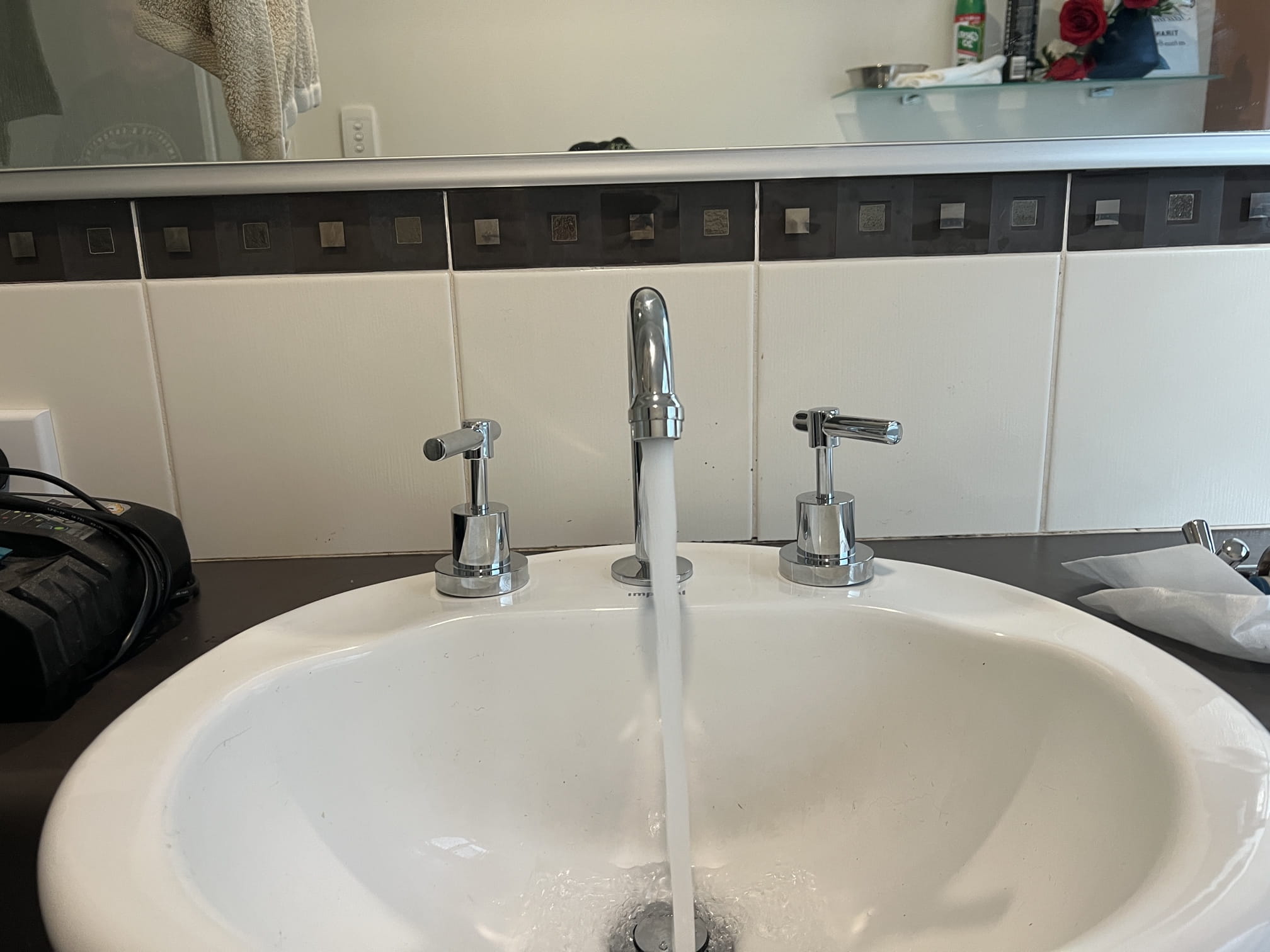 New taps running into a bathroom basin in Baldivis