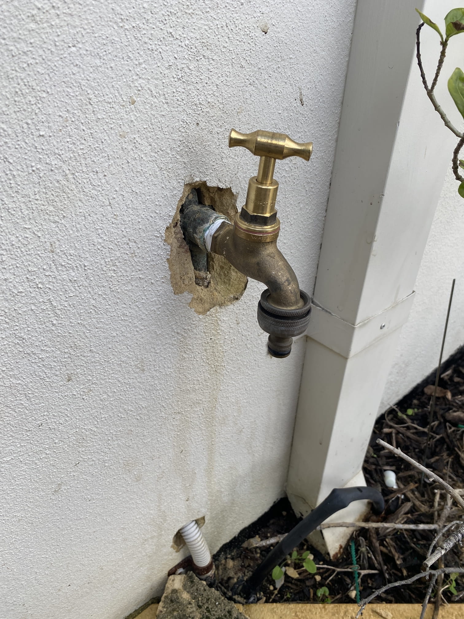 New garden tap fitted into the wall in Bayswater