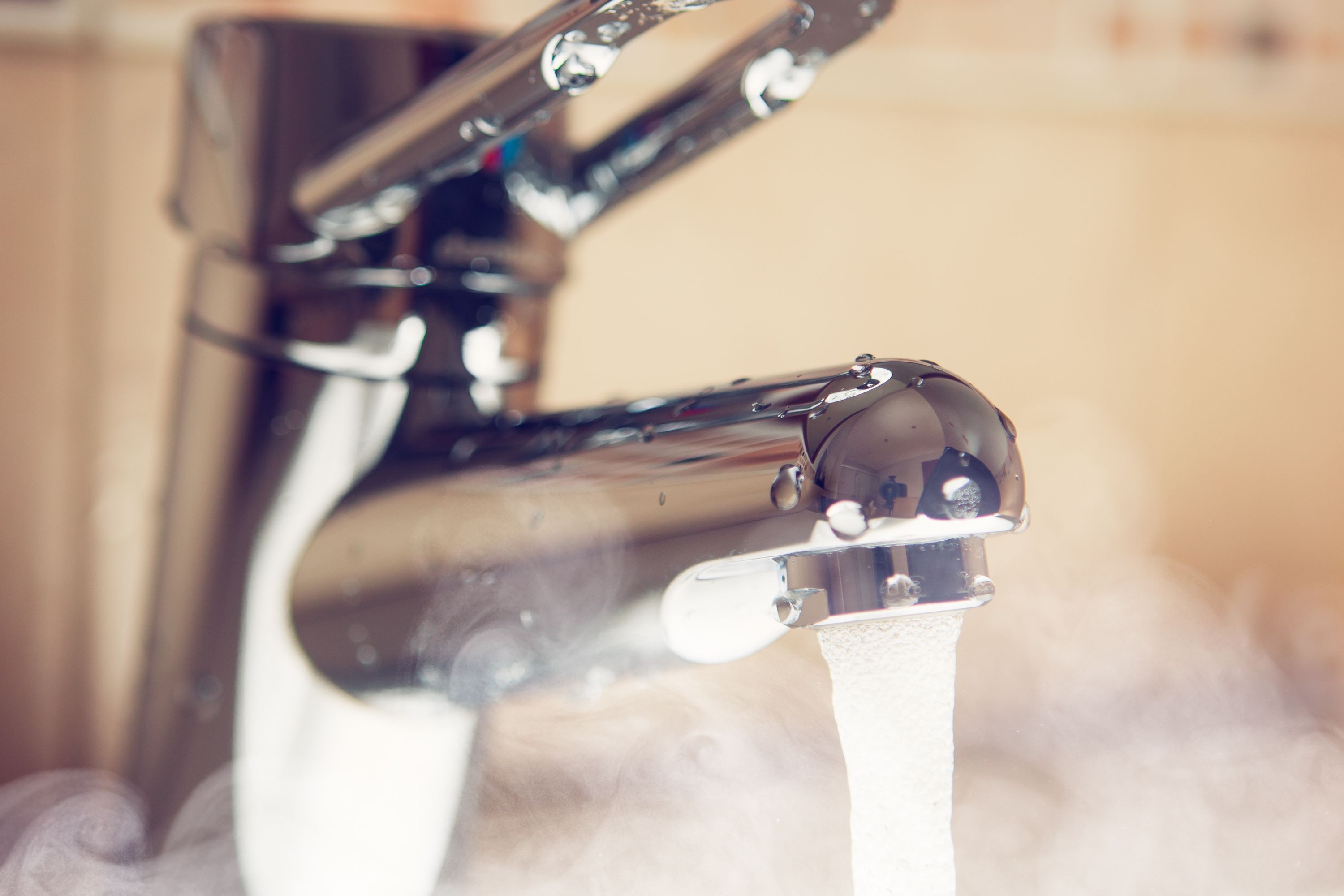 Using hot water to unblock a toilet